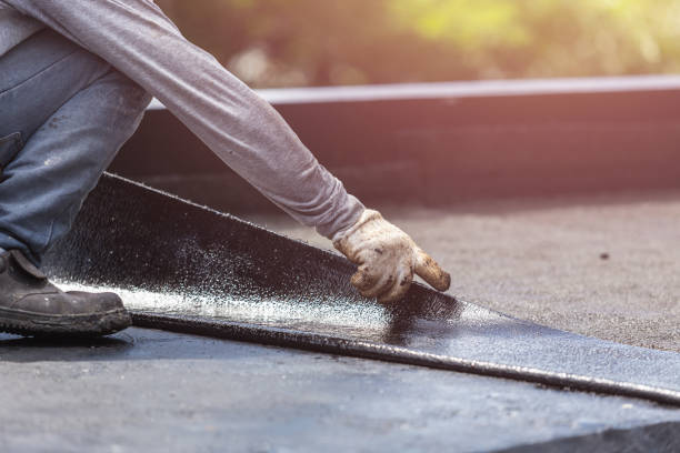 Professional Basement Waterproofing technician working in Philadelphia, TN